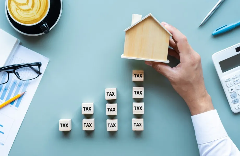What taxes do I have to pay when selling a property in Catalonia?